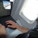 Alex blogging on the flight