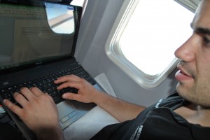 Alex blogging on the flight